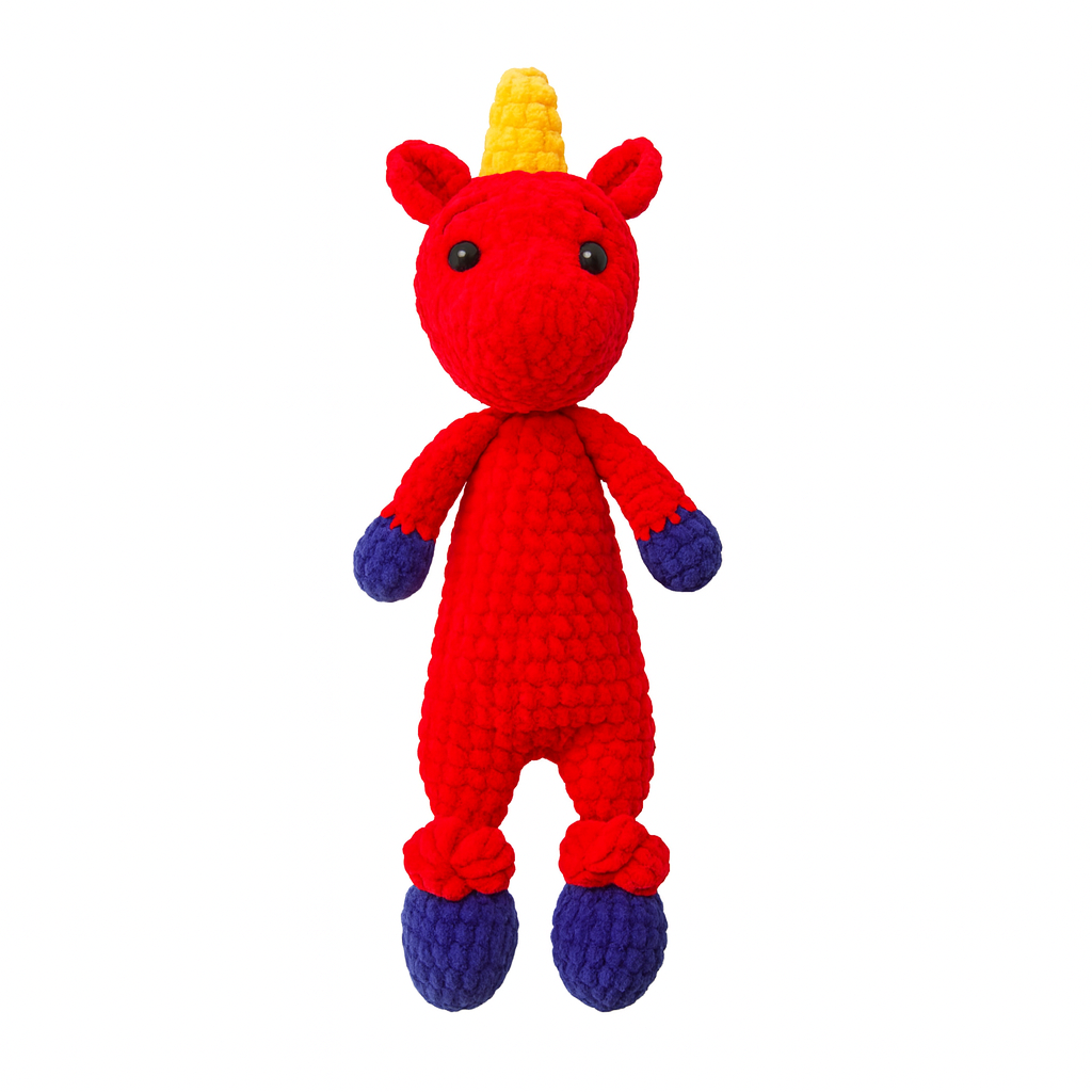 Crocheted dragon toy with a rainbow-colored mane