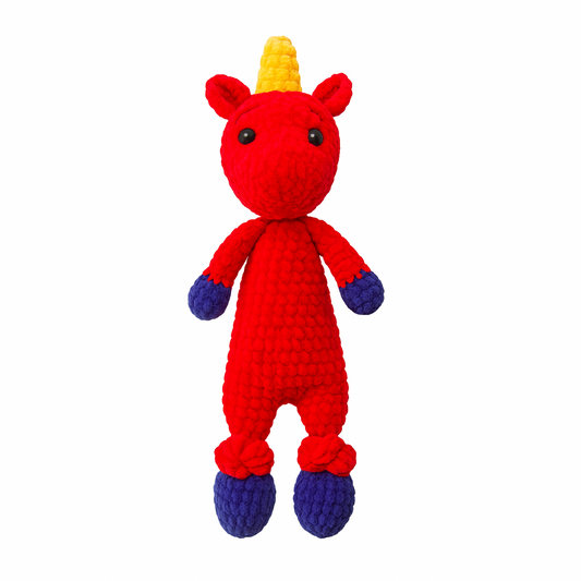 Crocheted dragon toy with a rainbow-colored mane