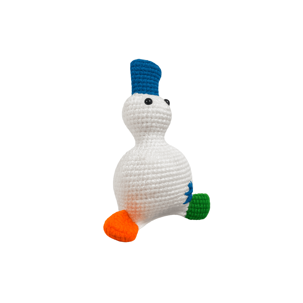 Crocheted toy duck with a blue beak, orange and green feet