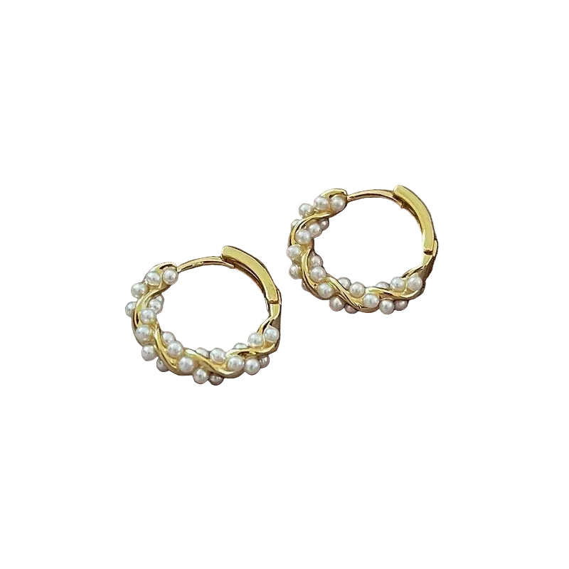 Pair of gold hoop earrings with pearl accents