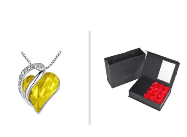 A set of a heart-shaped pendant necklace with a Yellow crystal pendant surrounded by smaller clear crystal and a box.