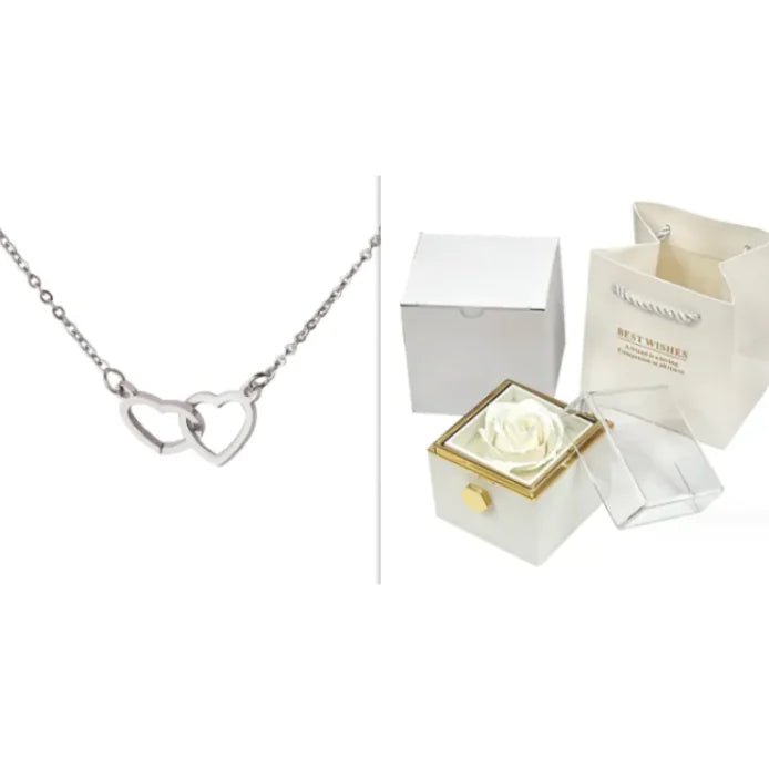 White rose in a box with a Silver necklace