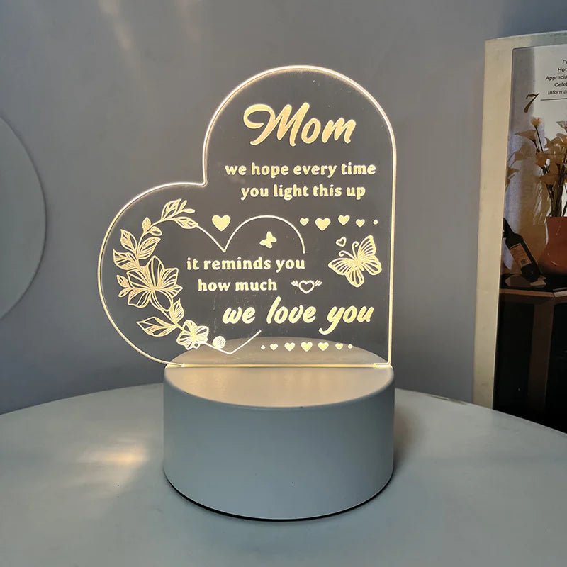 An engraved acrylic night light with a message to a Mom