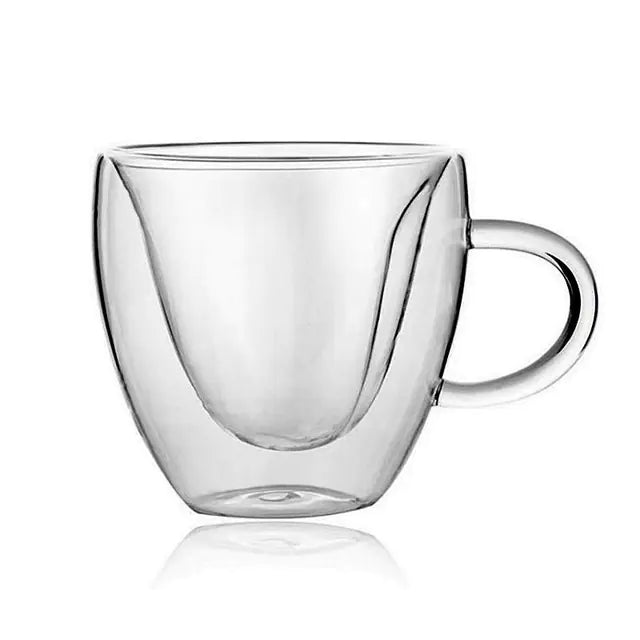 Two clear glass mugs with heart-shaped interiors filled.