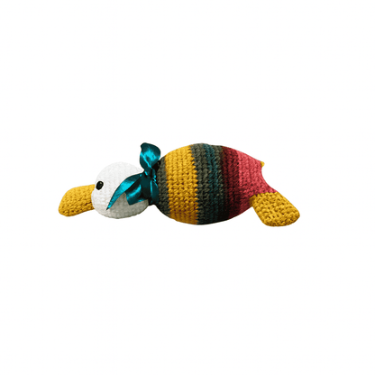 Colorful toy duck with a green ribbon