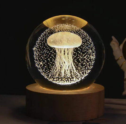 A crystal ball night lamp with a jellyfish design