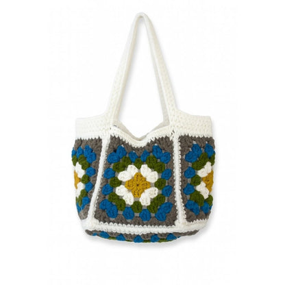 Crocheted bag with a geometric pattern with white straps