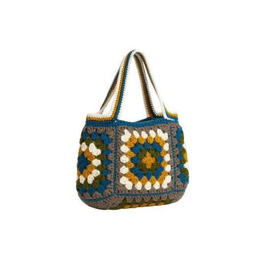 Crocheted bag with a colorful square pattern with a colorful straps 
