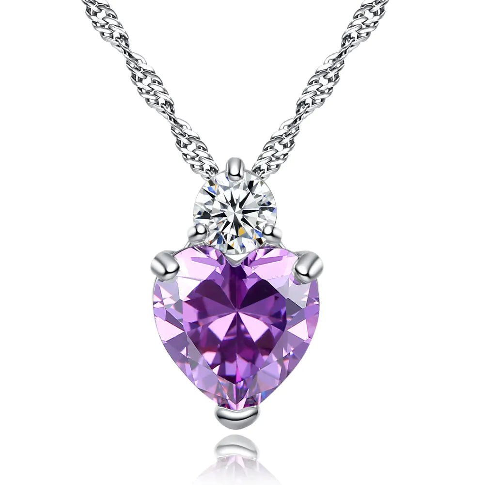 A heart-shaped zircon necklace with a white copper chain, featuring a prominent purple zircon crystal