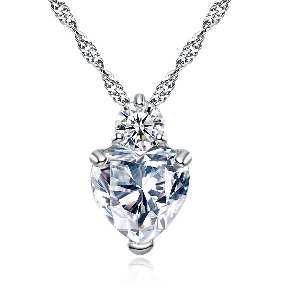 A heart-shaped zircon necklace with a white copper chain, featuring a prominent transparent zircon crystal
