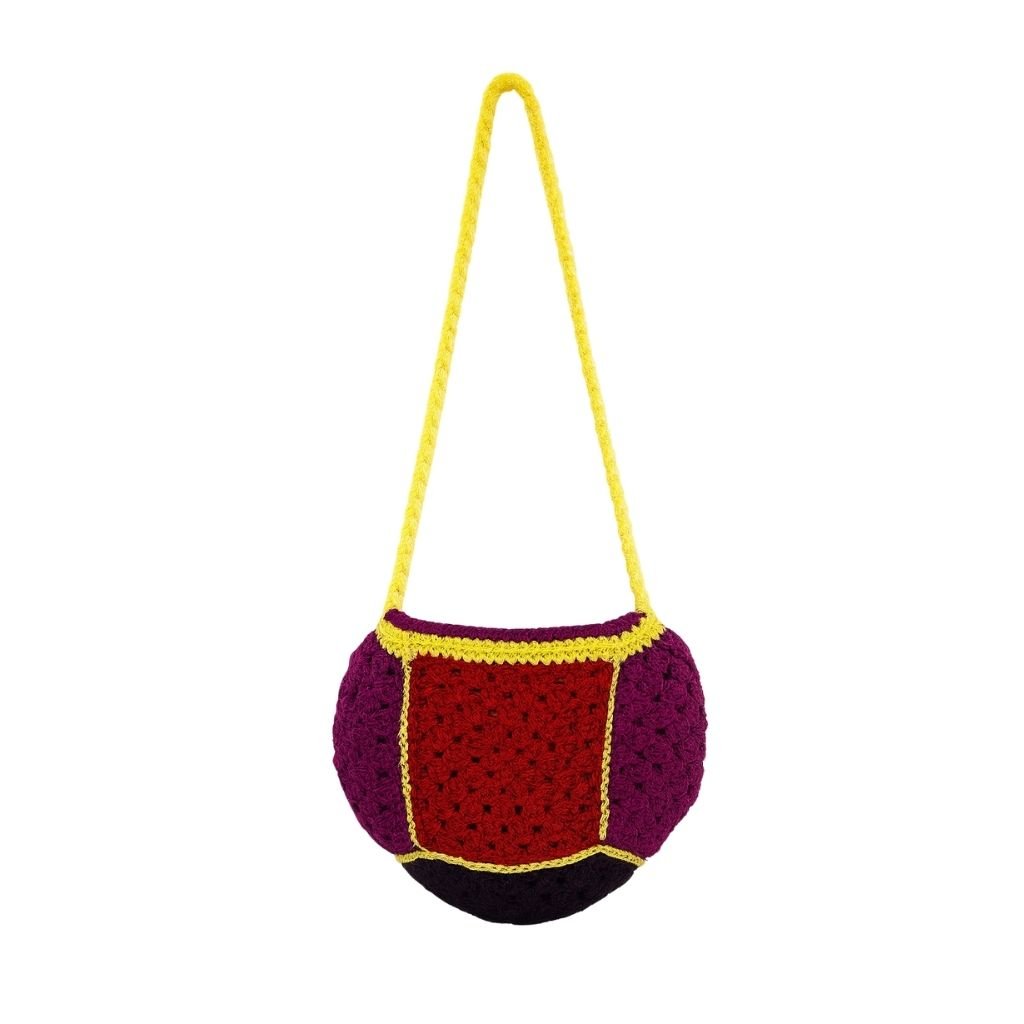 Crocheted lava punch bag with a yellow handle