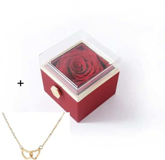 Red rose in a box with a Gold necklace 